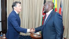 World Athletics president Seb Coe (left) and president William Ruto