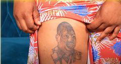 Maryanne Njoku, shows off the thigh tattoo of Mike Sonko's face