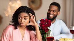 A lady on awkward dinner date