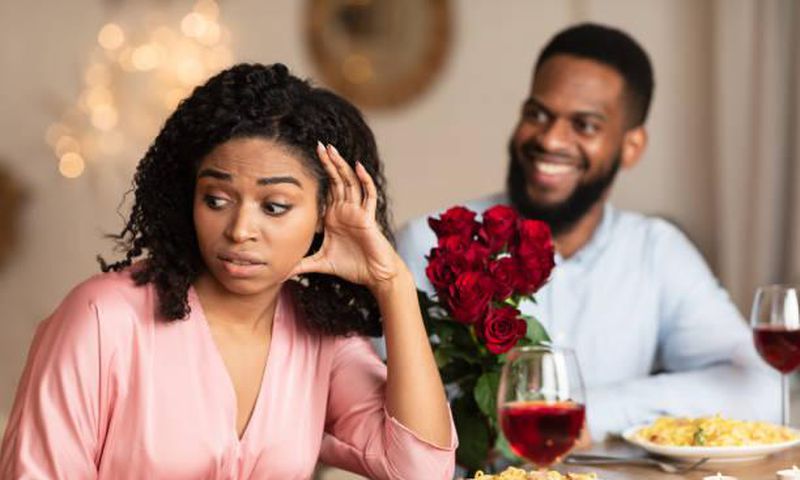 A lady on awkward dinner date