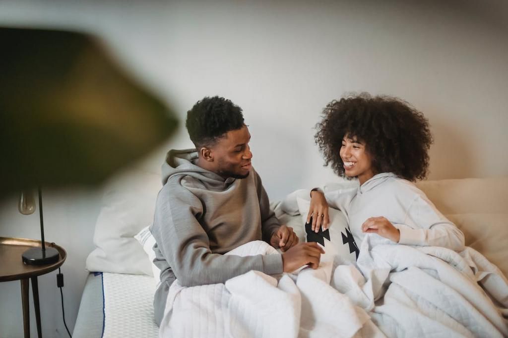 Couple smiling at each other