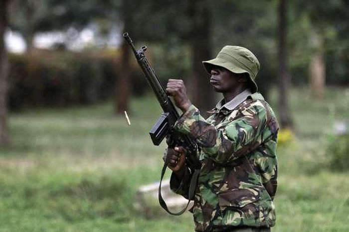 A past image of a police officer holding a gun