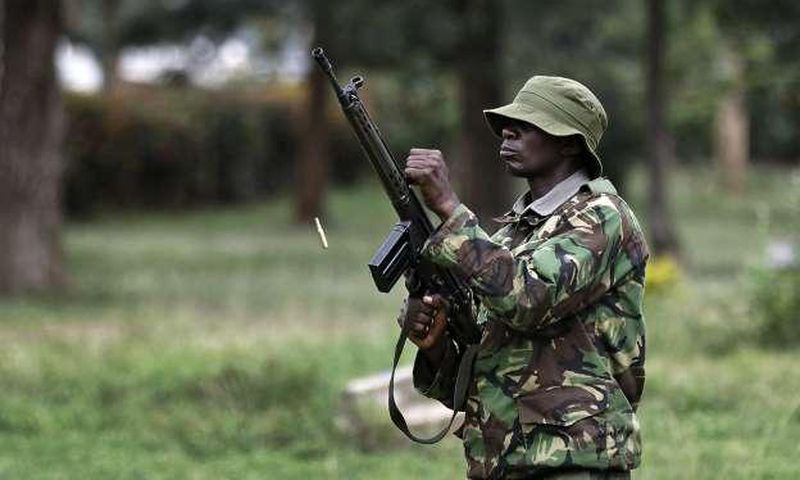 A past image of a police officer holding a gun