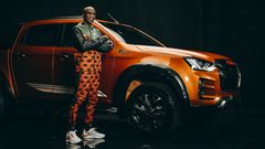 Eliud Kipchoge poses with the Eliud Kipchoge 1:59 Limited Edition Isuzu D-Max