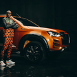 Eliud Kipchoge poses with the Eliud Kipchoge 1:59 Limited Edition Isuzu D-Max