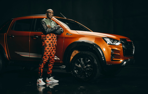 Eliud Kipchoge poses with the Eliud Kipchoge 1:59 Limited Edition Isuzu D-Max