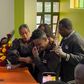 Screenshot of Eric Omondi being comforted by wife Lynne Njihia during memorial service of his late brother Fred Omondi on June 28, 2024