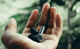Wireless earphones in a person's hand [Image: Swamy K]