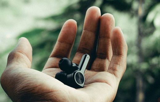 Wireless earphones in a person's hand [Image: Swamy K]