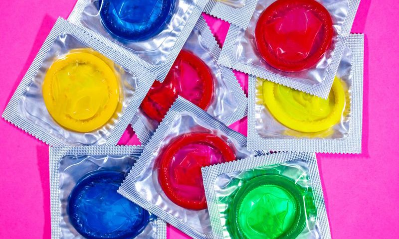 Don't store condoms anywhere where the temperature can get above 104 degrees Fahrenheit. mikroman6/Getty Images