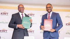 KWFT MD Kariuki Kitabu with AGF Group CEO Jules Ngankam after signing a risk-sharing partnership agreement in Nairobi on May 6, 2024