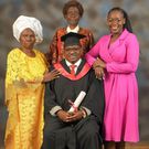 Steve Ogolla celebrates his graduation with his family