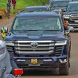 President William Ruto riding in a Landcruiser 300 series