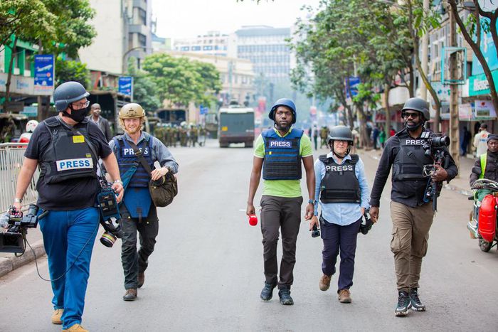 Larry Madowo reporting during the anti-Finance Bill protests