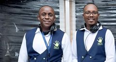 Abel Mutua and Phil Director