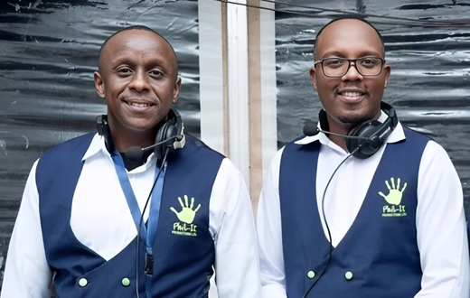 Abel Mutua and Phil Director