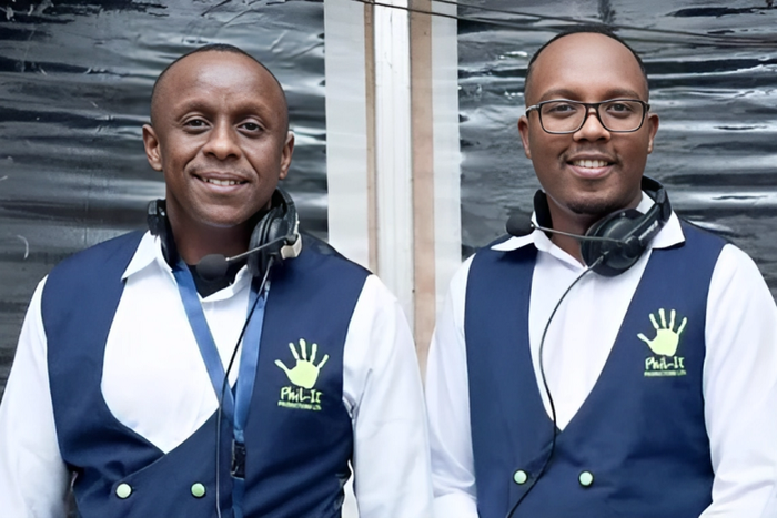 Abel Mutua and Phil Director