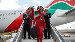 Retired KQ staffer Alice Waweru alights from a KQ plane on her last day of working after serving the company for 38 years.