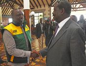 DP Ruto shakes hands with Raila Odinga at Windsor during the IEBC meeting with presidential candidates.