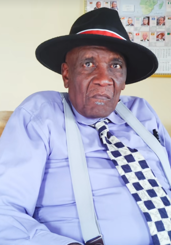 Musembi Nthenge wearing one of his iconic hats