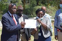 Musembi Nthenge displaying his IEBC clearance certificate