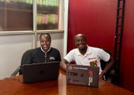 Apexloads founder Charles Thuo with Support Specialist Judith Mirembe in Kampala, Uganda