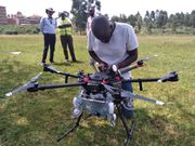 Man servicing a drone