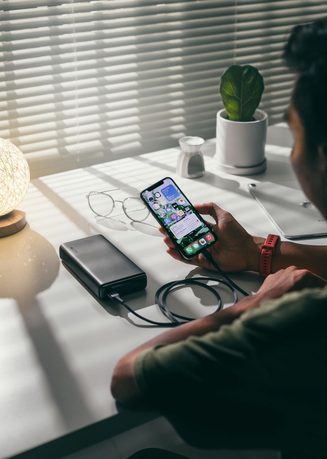 A person using a power bank