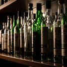 An AI-generated image of alcohol bottles on a shelf