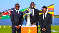 Victor Wanyama of Kenya, Denis Onyango of Uganda, and Mrisho Ngasa of Tanzania with the CHAN 2024 trophy