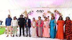 Court of Appeal judge Aggrey Muchelule and his wife Judy Kerich pose for photos with guests at their colourful wedding on Friday, November 29.