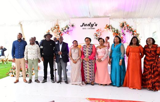 Court of Appeal judge Aggrey Muchelule and his wife Judy Kerich pose for photos with guests at their colourful wedding on Friday, November 29.