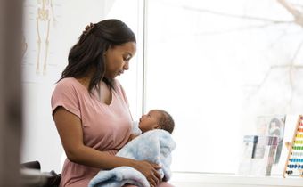 A mother holding her child