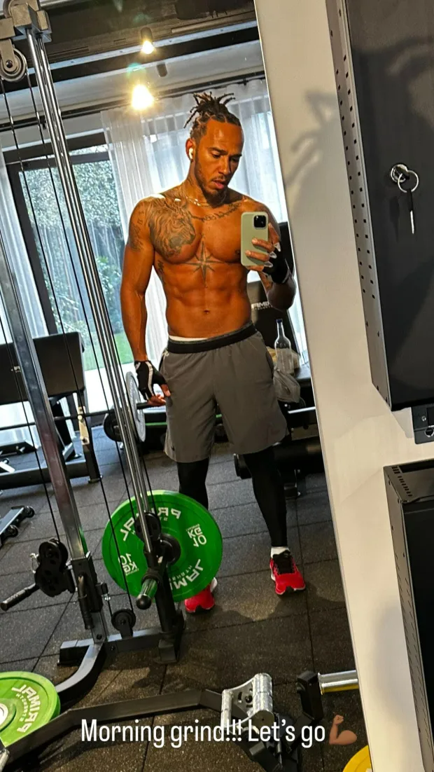 Lewis Hamilton shows off ripped abs and tattoos ahead of new season ...