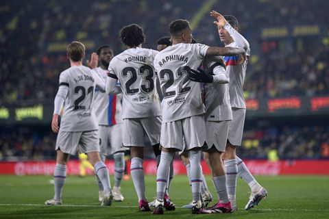 Barcelona players celebrating a goal