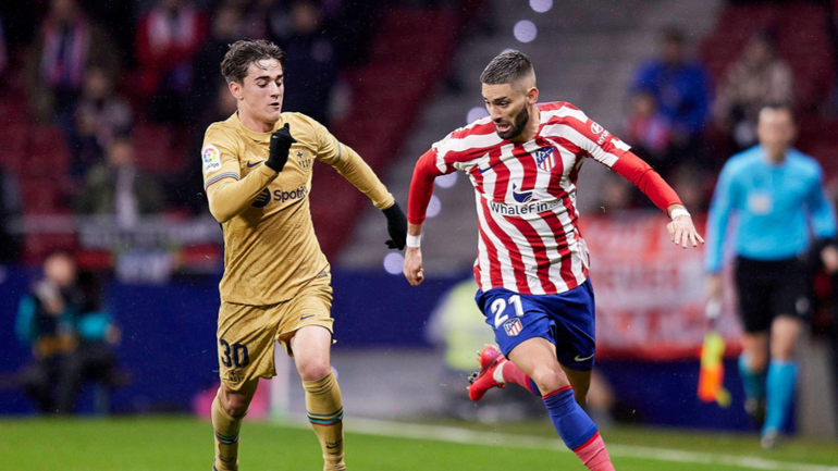 Carrasco of Atletico de Madrid and Pablo Martin Gavira Gavi of FC Barcelona, Barca during La Liga football match between Atletico de Madrid and FC Barcelona