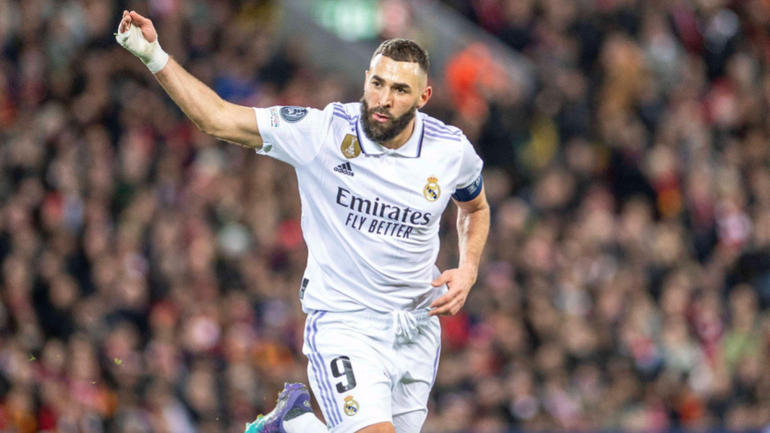 Benzema celebrates after scoring against Liverpool