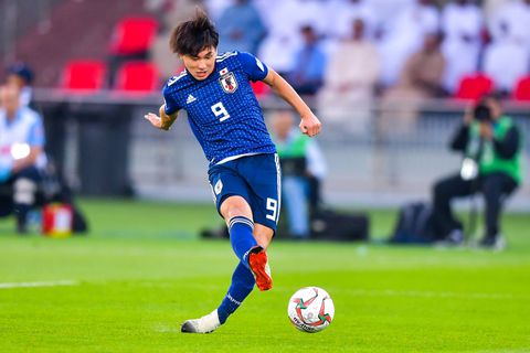 Takumi Minamino playing for Japan