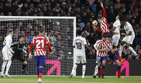 Correa heads Atletico Madrid ahead in the game